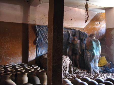 day 4 pottery kneading clay.jpg