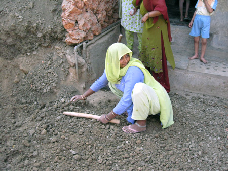 day 4 pottery, crushing clay.jpg